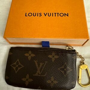 Authentic Key Pouch with box and dust bag.